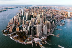 Bird's-eye view of New York City, featuring the diverse architecture and dynamic layout of the metro area