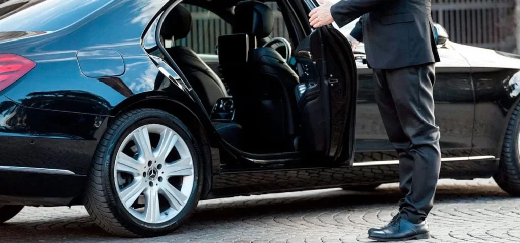 Airport Transfers 10 Chauffeur holded the door open for ride