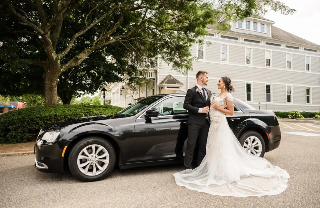 Chrysler 300 limousine decorated for a wedding promoting luxury wedding transportation services