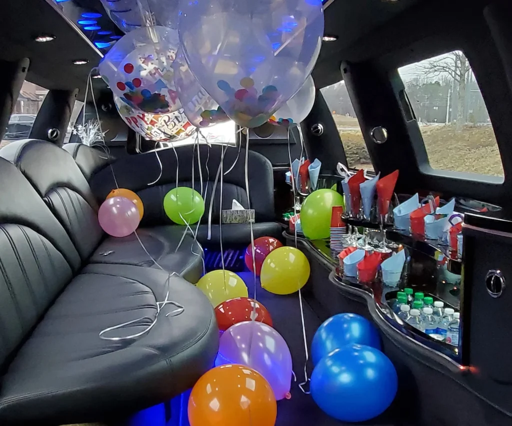 Anniversary Transportation 10 Decorated limousine filled with balloons, perfect for anniversary transportation celebrations