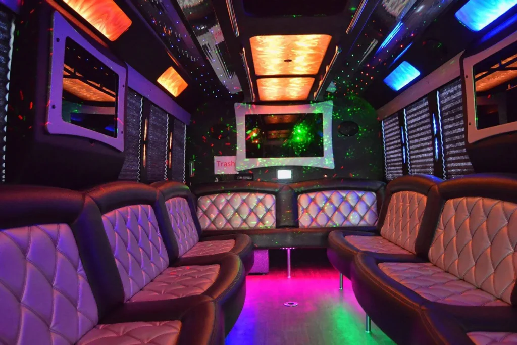 Stylish party bus with luxurious leather seats and bright neon lights, designed for an exciting nightlife experience