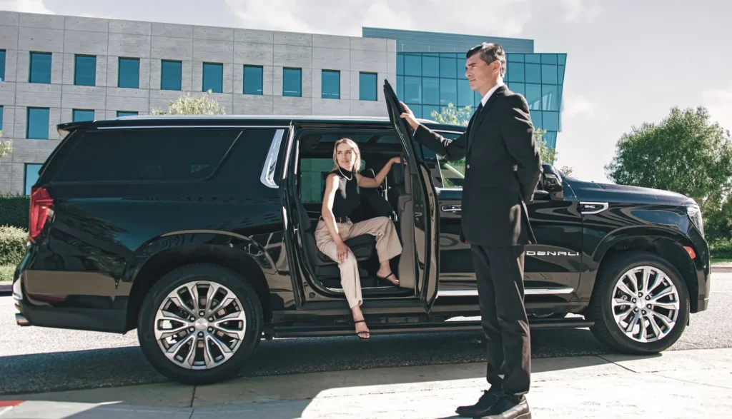 Articles 44 Woman stepping into a black SUV, highlighting a top-tier car service in Los Angeles
